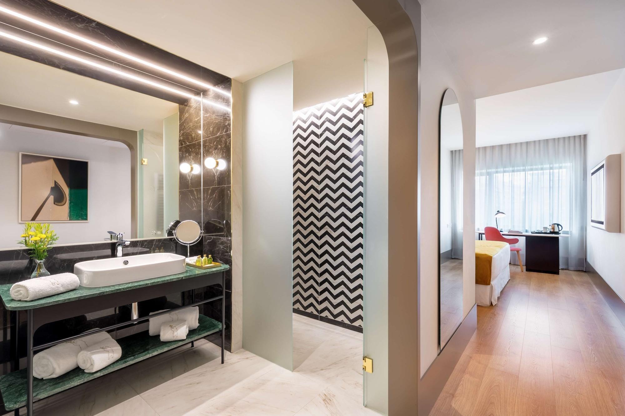 Barcelo Torre De Madrid Hotel Luaran gambar Deluxe Room