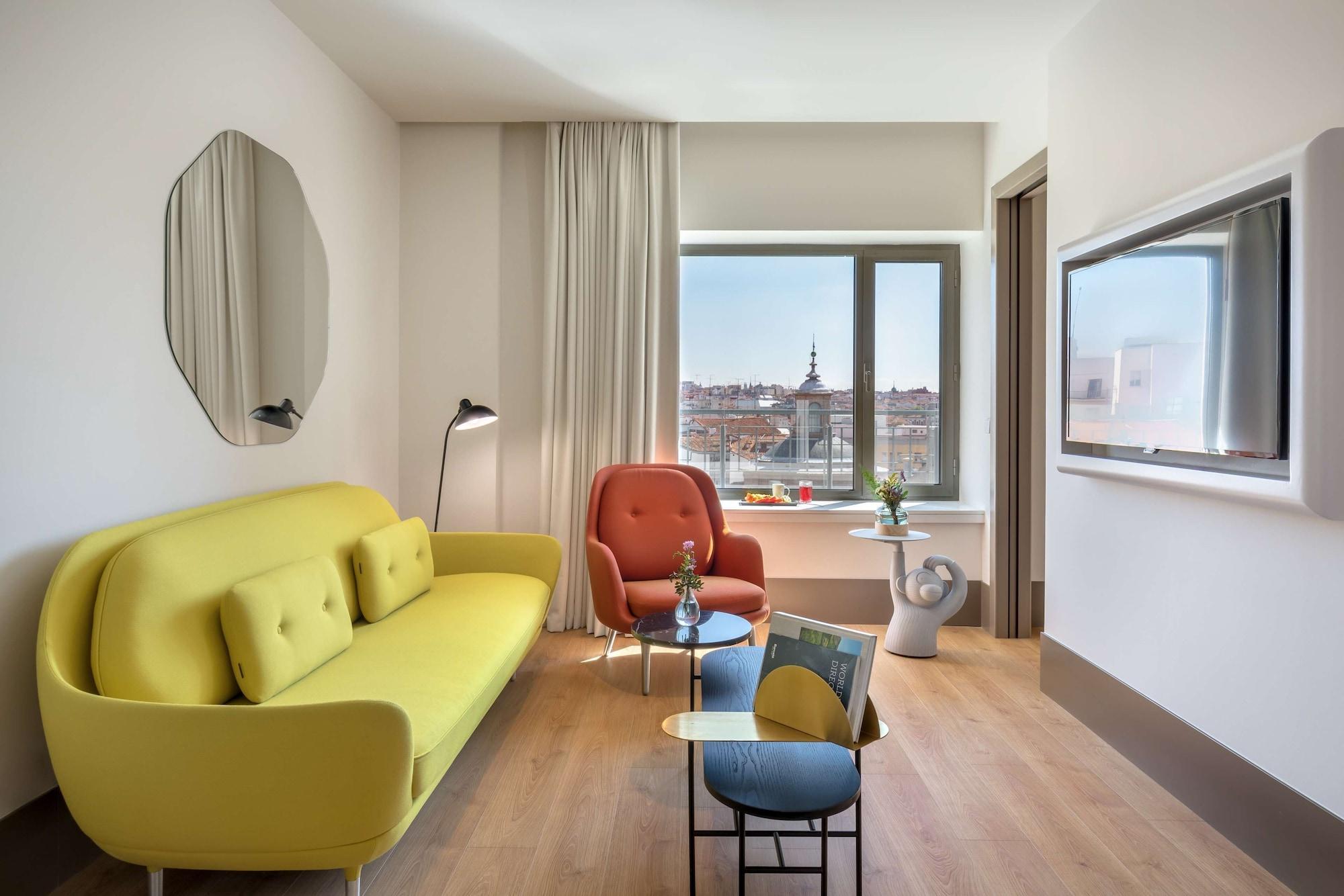 Barcelo Torre De Madrid Hotel Luaran gambar Suite
