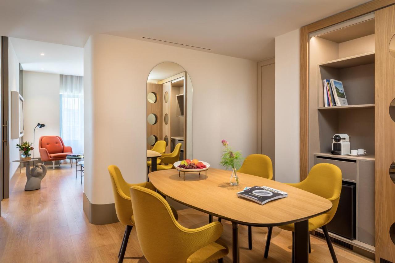 Barcelo Torre De Madrid Hotel Luaran gambar A suite at the hotel